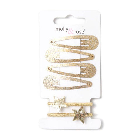 Gold glitter sleepies and 2 star elastics on a card.