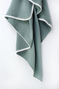 Green Pom Pom Swaddle Neutral Baby Co
